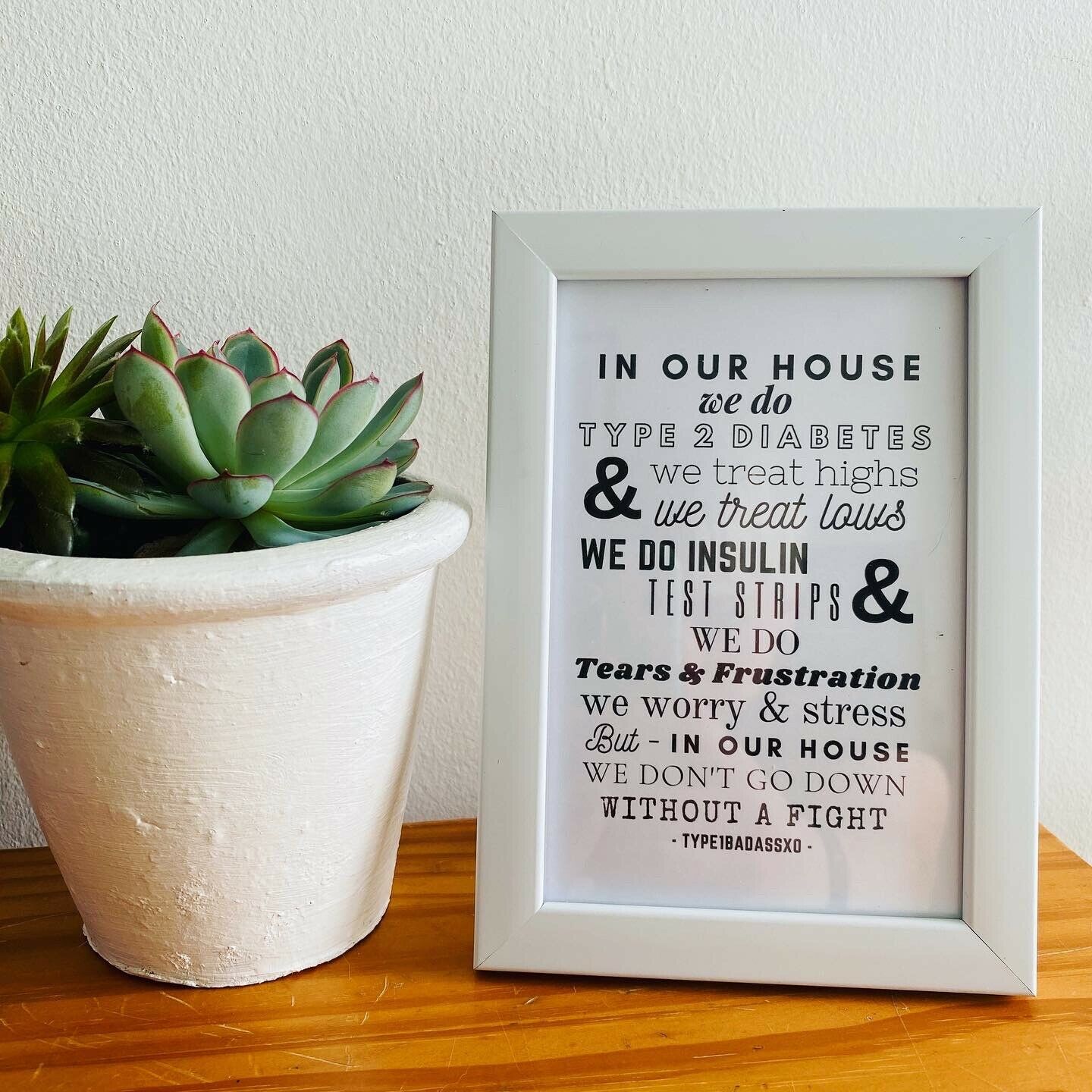 In This House We Don't Go Down Without A Fight Framed Art Print